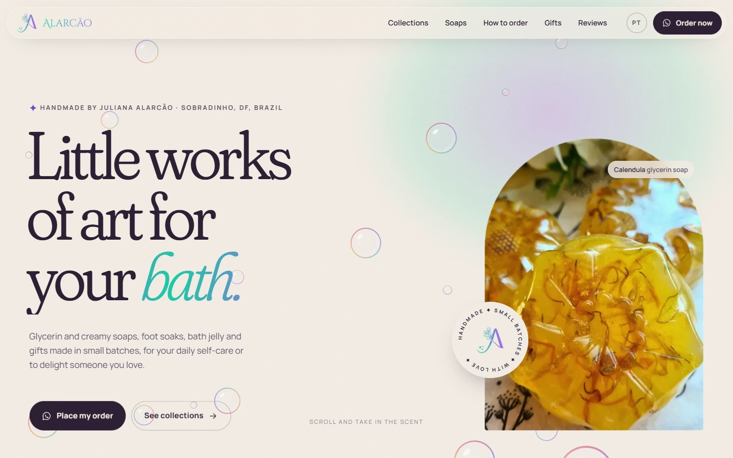 Alarcão Saboaria Artesanal website: opening view with the serif headline beside an arched photo of a calendula glycerin soap.